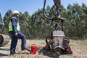 Man greasing an excavator